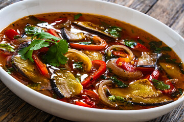 Vegetable soup on wooden table
