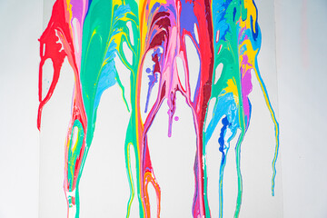 .Sweet tones flowing and blending together on the white floor. .It is a strange abstract picture..fantasy image of dripping paint on white background..colorful of pantone color background. .