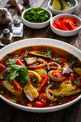 Vegetable soup on wooden table
