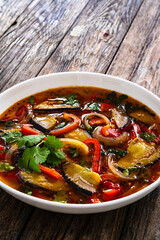 Vegetable soup on wooden table
