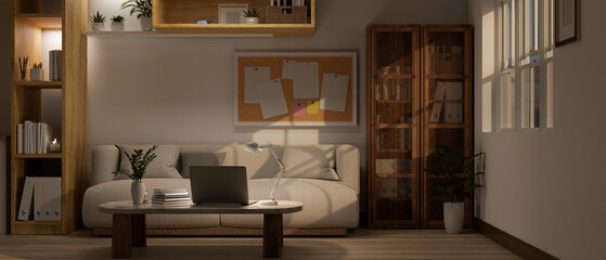 A modern and comfortable living room with a laptop on a coffee table. Home workplace
