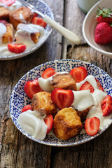 square syrniki with cream and strawberries