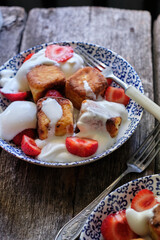 square syrniki with cream and strawberries