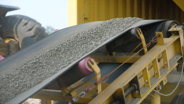 Feeder supplies aggregate from the hot bin to the dryer via a conveyor belt. Processing plants for stone, sand and gravel as asphalt base materials at Asphalt mixing plant to produce Asphalt Hotmix