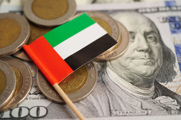 United Arab Emirates flag on coin and banknote money, finance trading investment business currency...