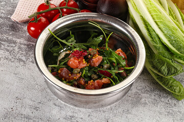 Salad with salmon and arugula