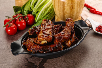 Grilled pork ribs in barbecue sauce
