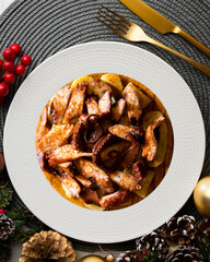Pulpo a la Gallega. Octopus cooked with boiled potato, paprika and olive oil. Galician octopus...