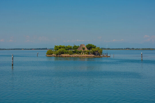 A traditional casone fisherman's hut on an island in the Grado section of the Marano and Grado Lagoon in Friuli-Venezia Giulia, north east Italy. August.