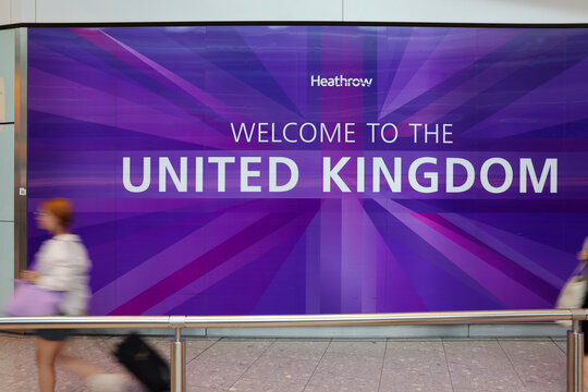 The "Welcome to the United Kingdom" sign at London Heathrow International Airport	