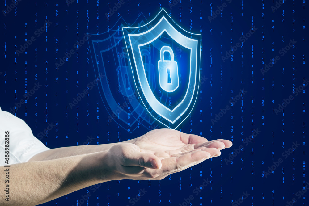 Poster close up of businessman hands holding creative digital security padlock and shield hologram on blurr