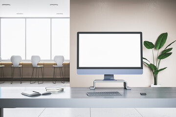Close up of empty white computer screen on wooden office desk. Window with city view and stools in the background. Mock up, 3D Rendering.