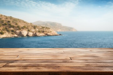 Scenic coastal view from a wooden table overlooking calm waters and distant hills on a sunny day