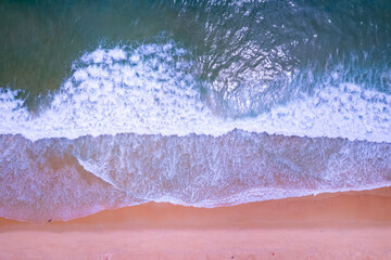 Fototapeta na wymiar Beautiful waves sea surface in sunny day summer background, Amazing seascape, Top view beach sea background