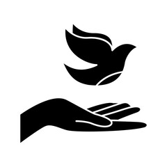 Hand offering free flying dove showing a beautiful symbol of peace. World peace icon in glyph style - obrazy, fototapety, plakaty