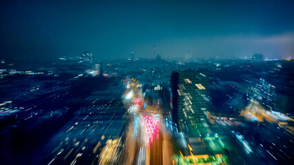 Aerial Citylight with motion blur and high speed in winter snow 