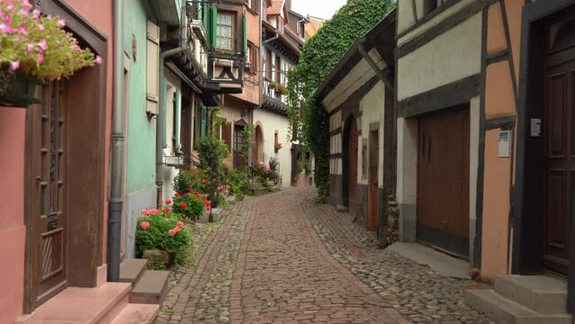Eguisheim is pleasant to wander around the narrow paved streets full of beautiful old half-timbered houses with geranium-bedecked wooden windows and balconies