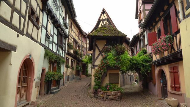 In Eguisheim visitors can find flowers on every window, every building, and every street corner