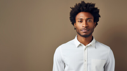 Man, 20s, with afro-textured hair, white shirt