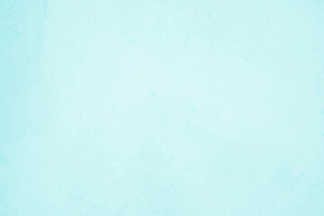 Pastel blue and white concrete stone texture for background in summer wallpaper. Cement and sand wall of tone vintage. Decorative abstract wall of light cyan color painted, Beautiful mint green decor.