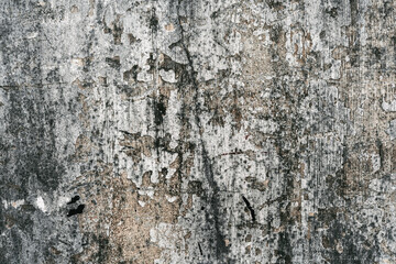 Grunge style urban weathered shabby  peeled painted concrete surface of the wall with holes, dirty and cracks macro