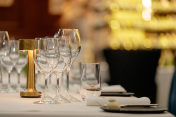 Wine glasses with blurry restaurant background. 