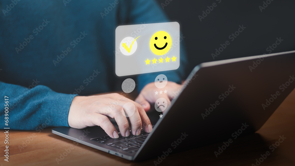 Poster user use a laptop give point with virtual screen on smile face icon for satisfaction in opinion and 