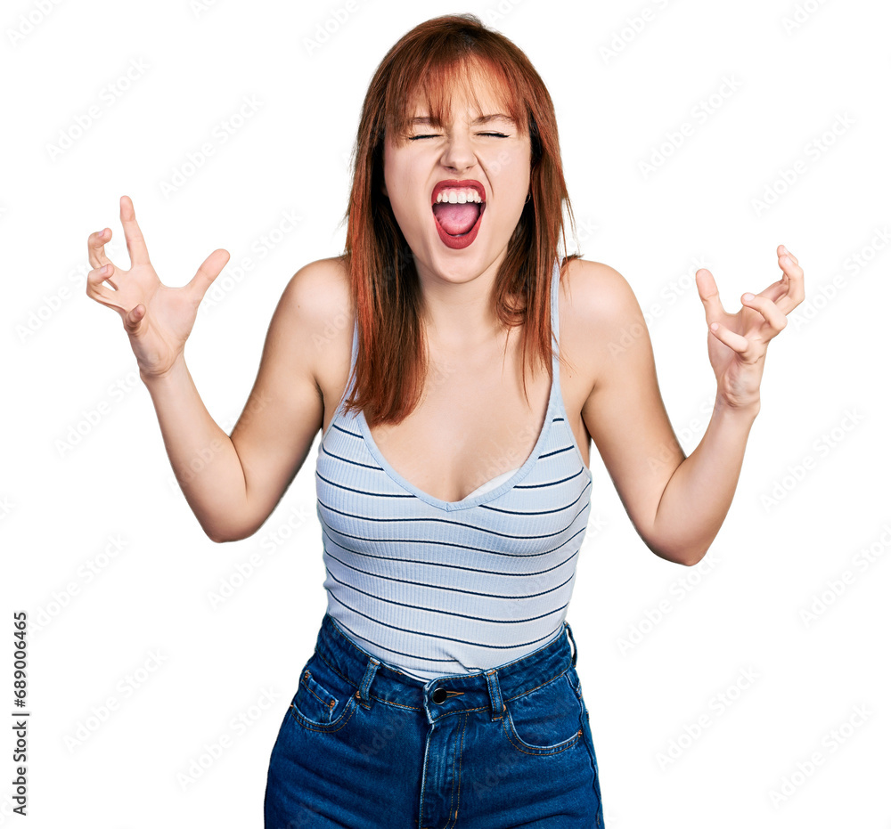 Canvas Prints redhead young woman wearing casual style with sleeveless shirt crazy and mad shouting and yelling wi