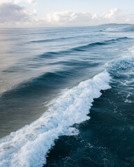 aerial view of waves in the ocean