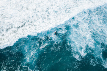 Fototapeta na wymiar aerial view of waves in ocean