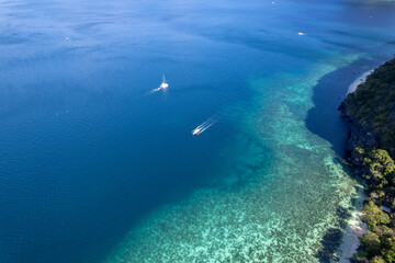 Fototapeta premium aerial view of boats in the ocean