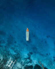 aerial view of a boat in the ocean