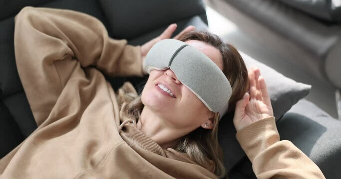 The Face Of A Woman With A Virtual Mask For Sleeping, Close-up, Elevated View. Home Device For Relaxation