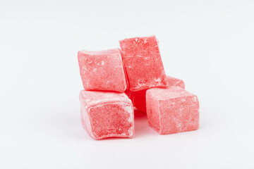 Traditional Turkish delight isolated on white background. Close up.