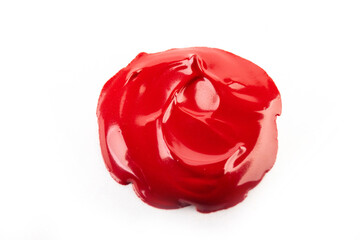 Paint red spot, isolated on white background. Glossy akril paint. Abstract trace shape. Drops of...