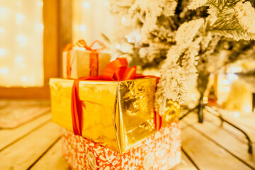 presents under Christmas tree, festive and celebratory atmosphere.