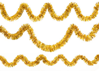 Christmas yellow golden foil tinsel isolated on a white background.