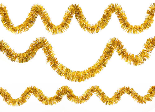 Christmas yellow golden foil tinsel isolated on a white background.