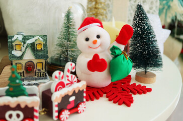Colorful Christmas Decorations with Puffy Snowman and Wooden Toys 