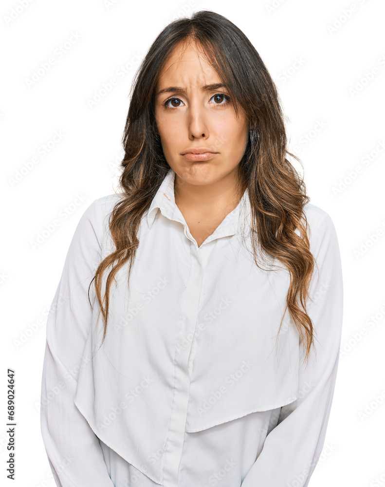 Sticker Young brunette woman wearing casual clothes depressed and worry for distress, crying angry and afraid. sad expression.