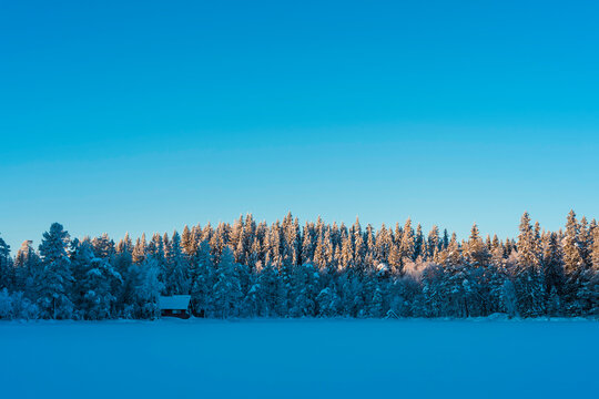By the Store Vaalsjoen Lake of the Totenaasen Hills, Norway, in winter.