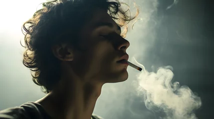 Foto op Aluminium Close up young man is smoking a cigarette © Kateryna Kordubailo