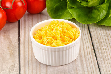 Shredded cheese in the bowl