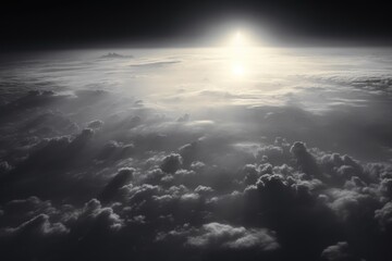 Obraz premium Aerial shot from a spacecraft capturing Earth's grandeur in grayscale and brown hues, featuring misty clouds during a cosmic dawn 