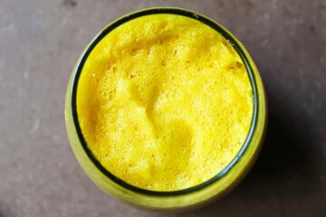 a glass of pineapple juice