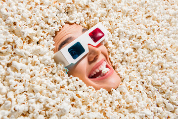 Above view photo of cheerful impressed person toothy smile eat watch movie 3d glasses face stick...