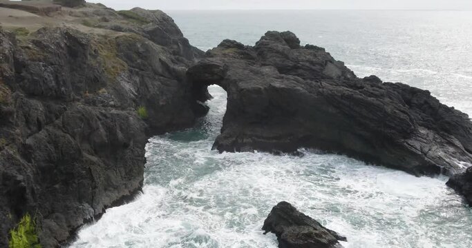 4k drone footage of rocky arch cliffside samuel boardman brookings oregon coast