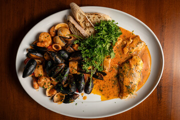 Branzino fish with mixed seafoods