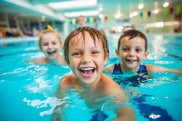 Diverse young children enjoying swimming lessons in pool, learning water safety skills, showing joy and camaraderie, representing a healthy lifestyle.