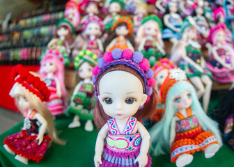 Dolls dressed in bright colours